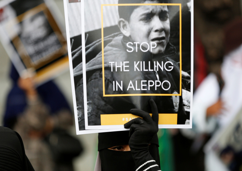 Протест у стен российского посольства в Джакарте. Фото: Darren Whiteside / Reuters
