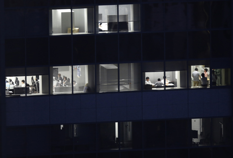 Офисное здание в Токио. Фото: Issei Kato / Reuters