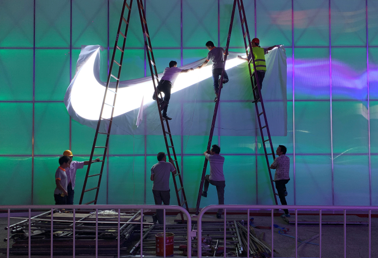 Магазин Nike в Пекине. Фото: Tingshu Wang / Reuters